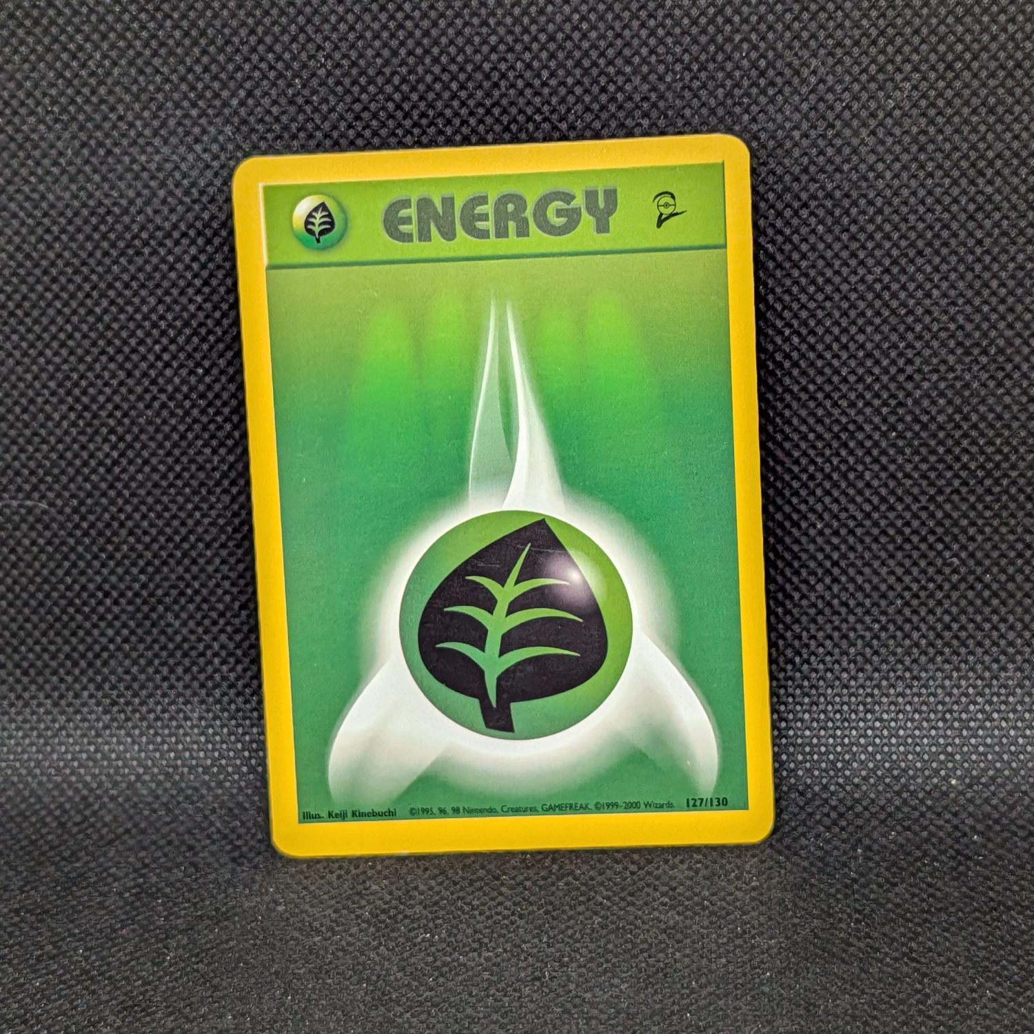 Pokémon Grass Energy Base Set 2 127/130 Common · Lightly Played