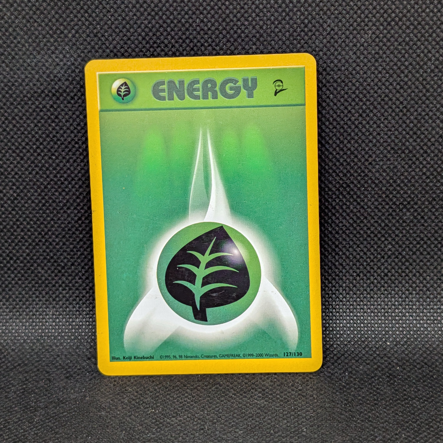 Pokémon Grass Energy Base Set 2 127/130 Common · Lightly Played