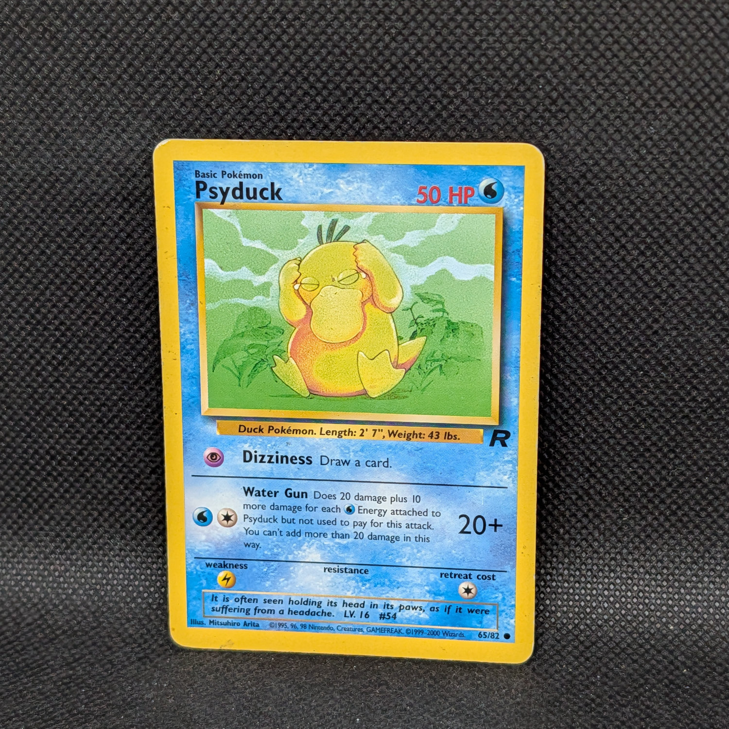 Pokémon Psyduck Team Rocket 65/82 Common Unlimited · Lightly Played