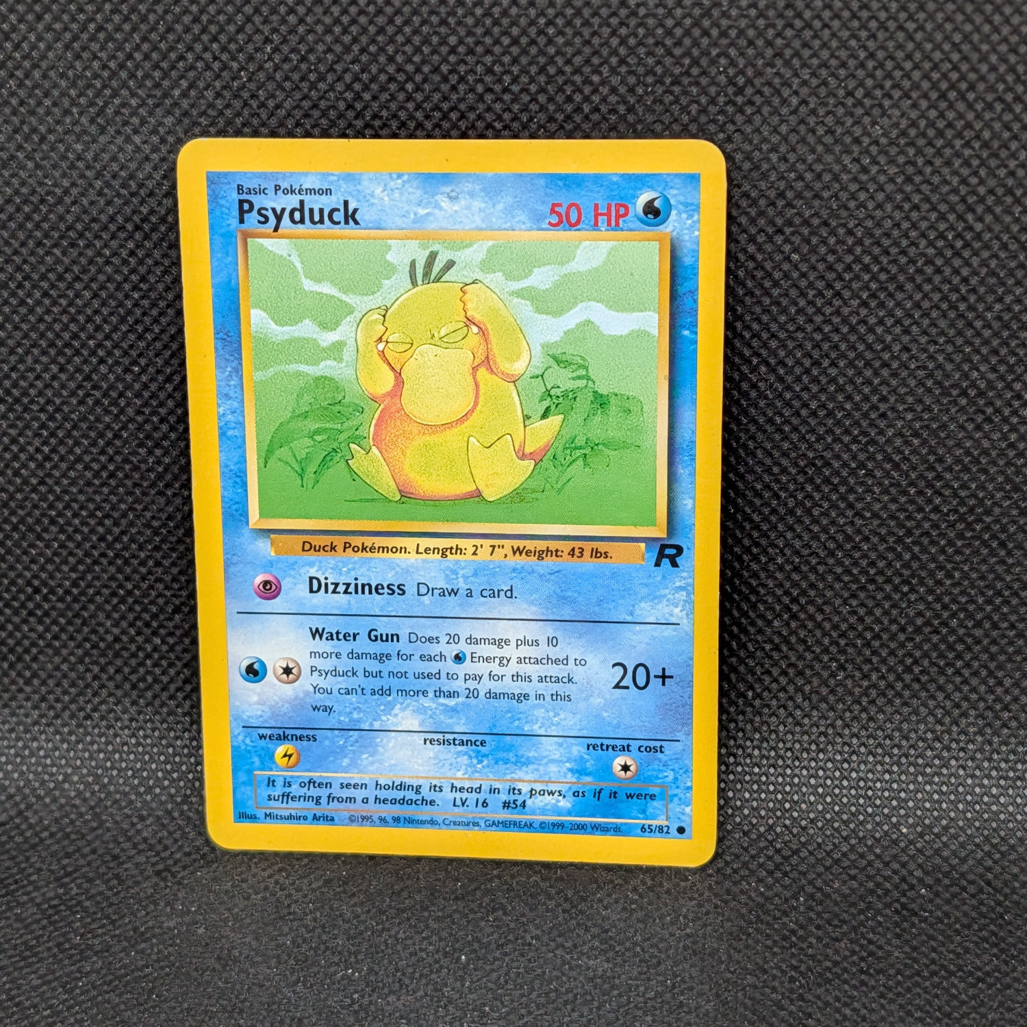 Pokémon Psyduck Team Rocket 65/82 Common Unlimited · Lightly Played