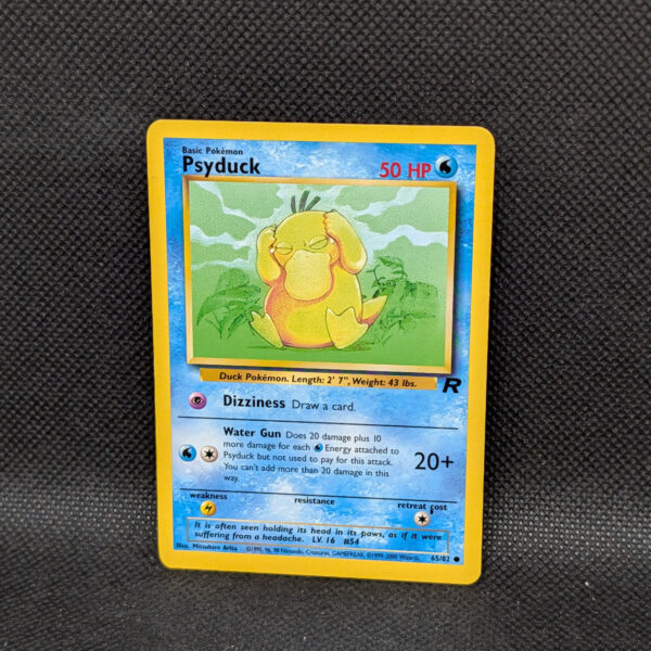 Pokémon Psyduck Team Rocket 65/82 Common · Lightly Played