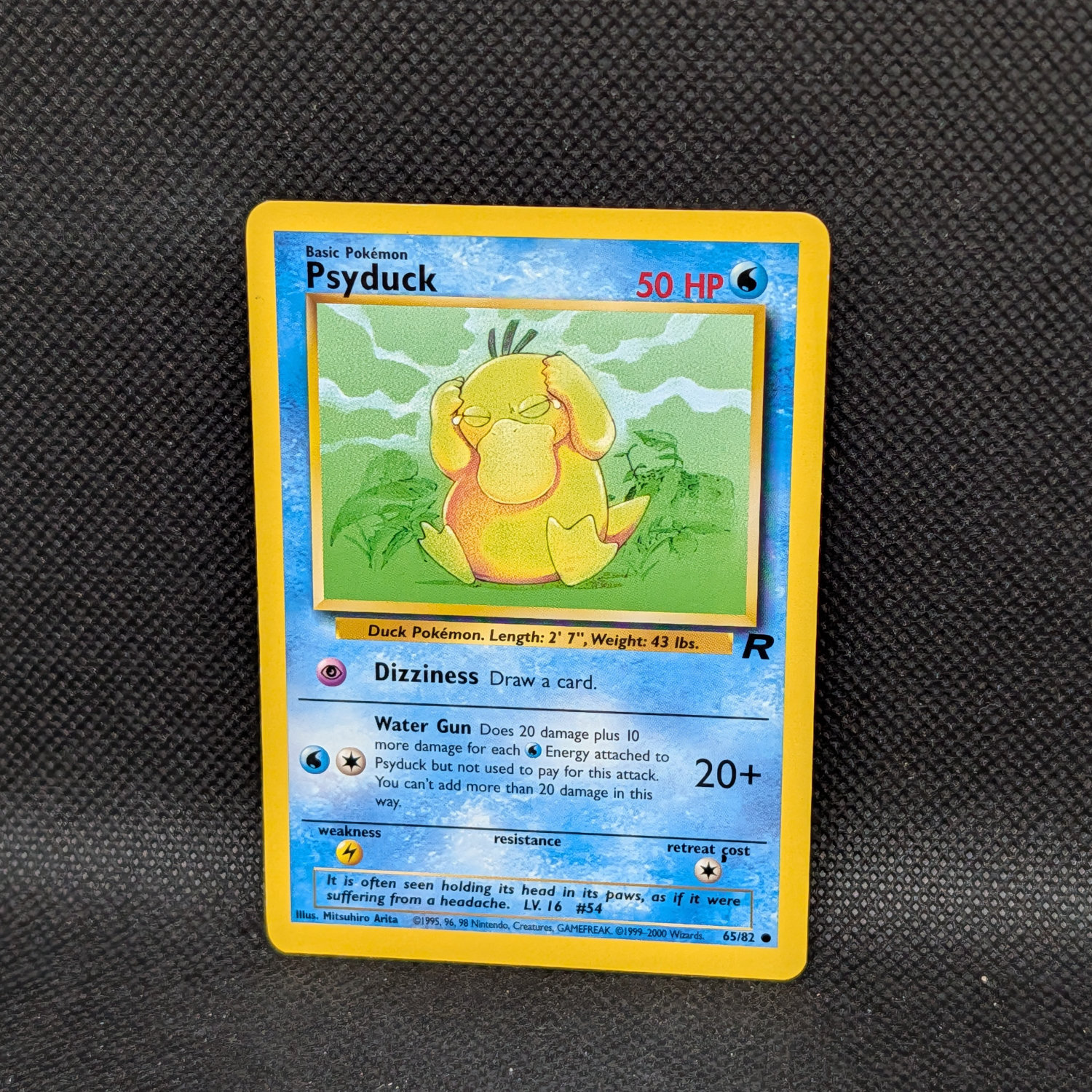 Pokémon Psyduck Team Rocket 65/82 Common · Lightly Played